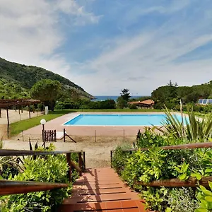 https://nisporto-appartamento-100-mt-dal-mare-e-piscina.it-tuscanyhotel.com
